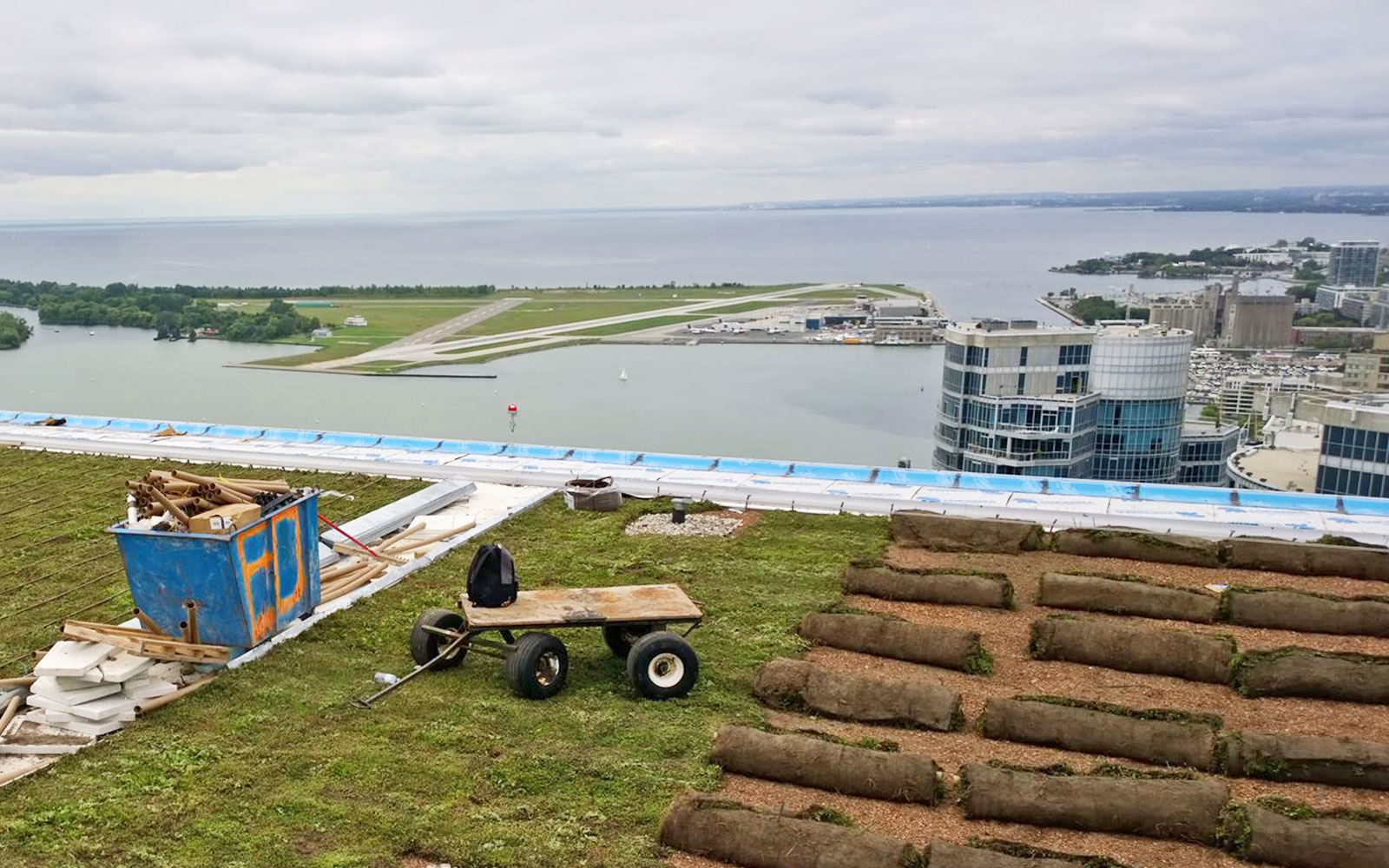 The high wind load requires additional measures to protect the System Build-up.   Pre-vegetated Sedum mats are being applied on a roof